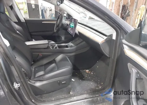 2023 Tesla Model Y Awd/Long Range Dual Motor All-Wheel Drive z USA, uszkodzony, nr VIN 7SAYGDEE4PA074009